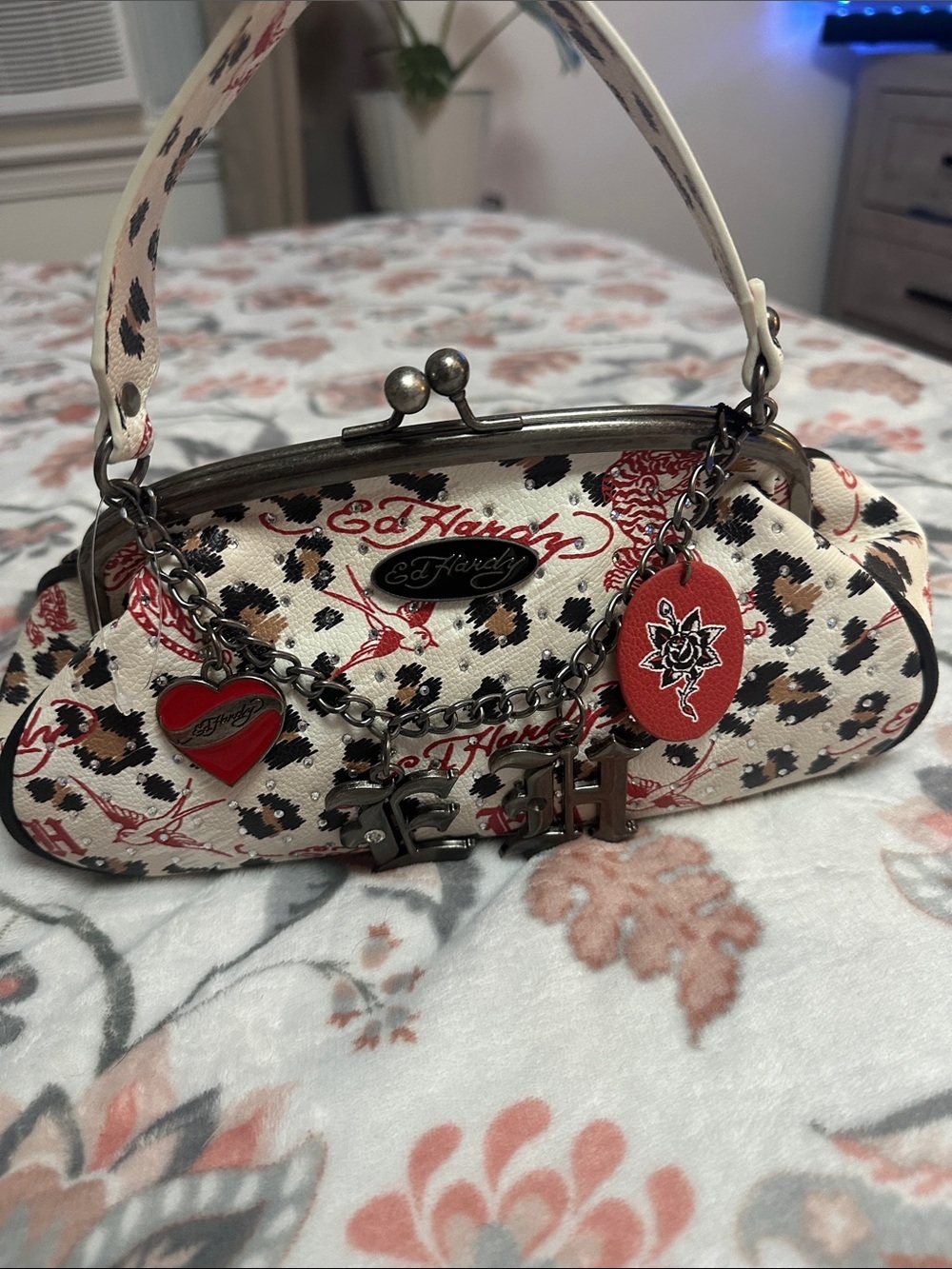 Ed Hardy Cream Leopard Print Frame Wristlet with Red Charm Details